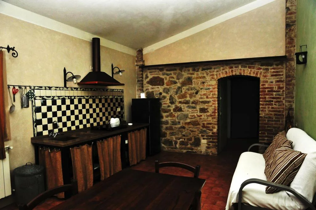 umbrie-agriturismo-le-more-appartement-peonie-keuken-woonkamer-03-casamia
