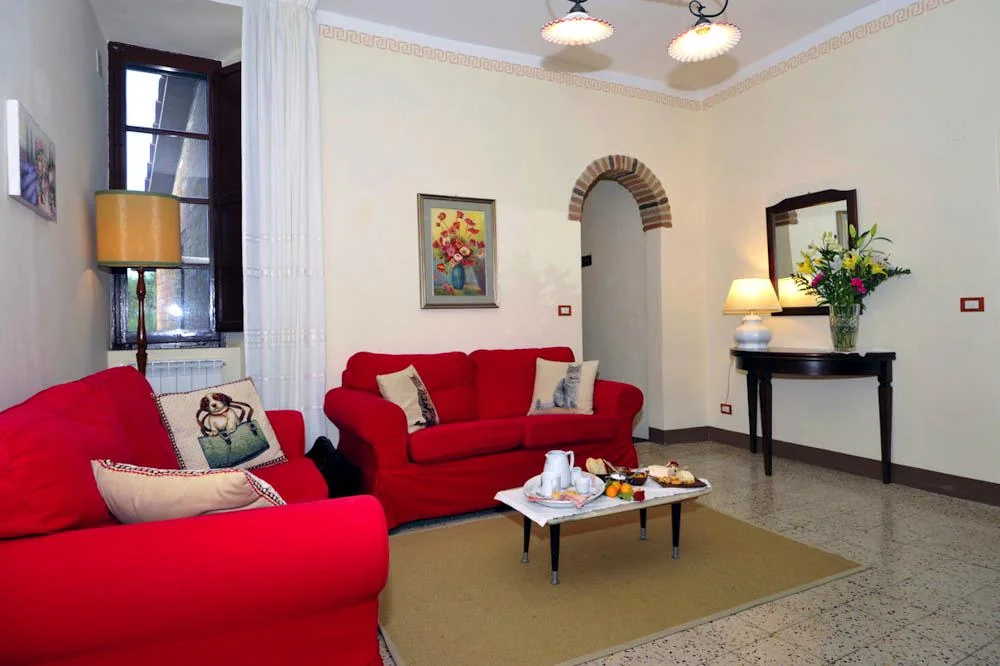 umbrie-villa-giara-algemeen-woonkamer-rode-zithoek-13-casamia