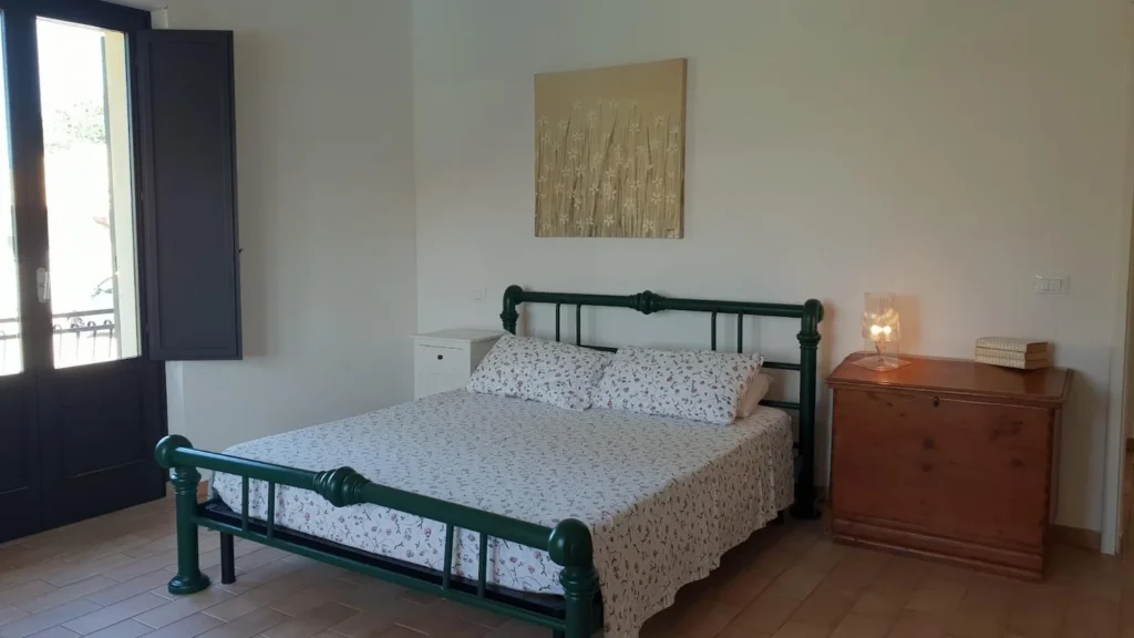 Umbrie villa silva algemeen slaapkamer groen bed
