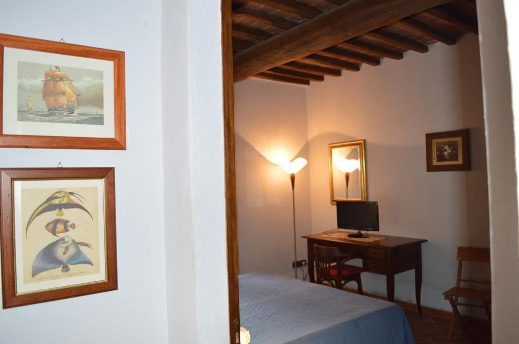 zuid-toscane-casa-la-medina-appartement-dante-slaapkamer-10-casamia