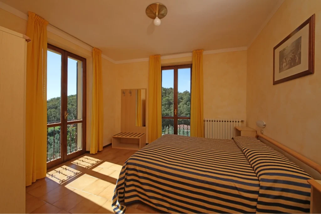 Merengebied san rocco relais suites met kitchenette studio slaapkamer