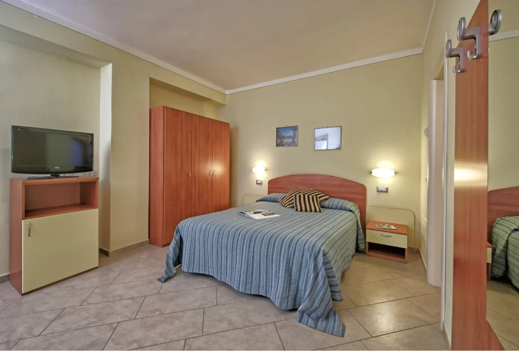 Merengebied san rocco relais suites met kitchenette suite slaapkamer