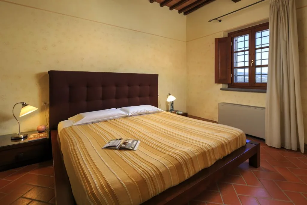 Noord toscane agriturismo streda appartement sangiovese slaapkamer tweepersoonsbed