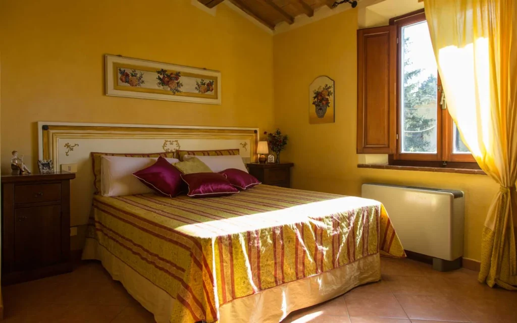 Toscaanse kust agriturismo il frutteto ciliegia slaapkamer overzicht