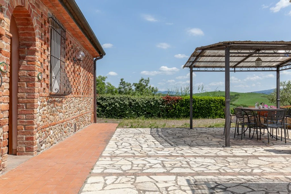 toscane-il-gattero-primula-gevel-met-terras-en-overkapping-casamia